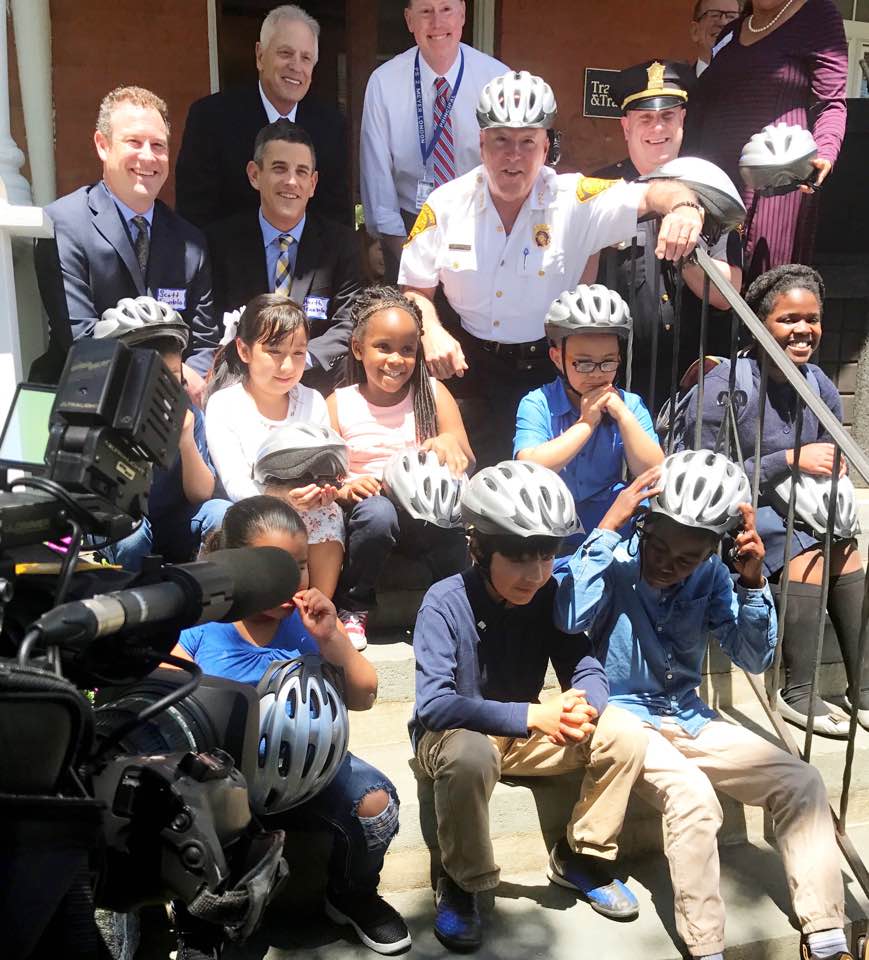 Trantolo family posing with Bridgeport children