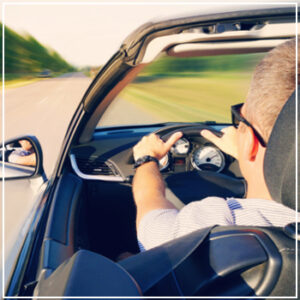 driver speeding on open road